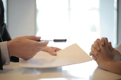 Businessman receiving document